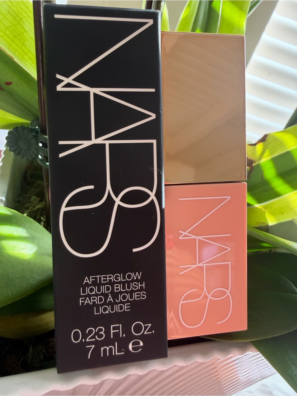 NARS Afterglow Liquid Blush — Coral Pink
